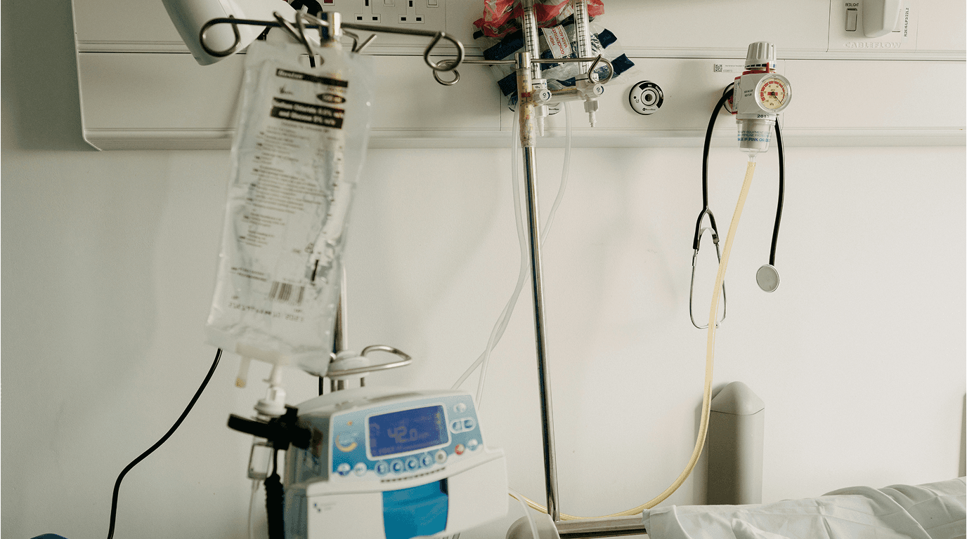 Television for a clinic: patient with family watching TV in a ward